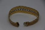 Bracelet maille serpent or 18k et centré d'une ligne de...