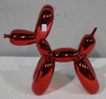 D'après Jeff Koons (1955-) "Balloon Dog". Sculpture réprésentant un chien...