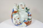Bouddha et 5 enfants en porcelaine polychrome, travail du XXème...