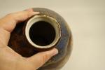 THARAUD - LIMOGES  : Vase boule en porcelaine à...