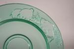 A. VERLYS, Plat circulaire en verre à décor de mammouths...
