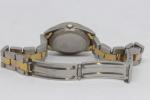 BAUME & MERCIER: Montre bracelet du modèle "BAUMATIC" en métal...