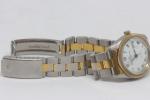 BAUME & MERCIER: Montre bracelet du modèle "BAUMATIC" en métal...