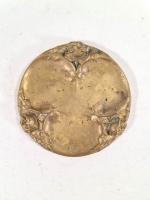 A. SADOUX (XXe), Vide-poche en bronze doré à décor de...