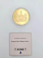 Lot numismatique 3 monnaies et médailles  commémoratives:
-ROYAUME UNI. Médaille...