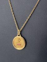 Médaille d'amour et sa chaîne en or jaune 750 mill....