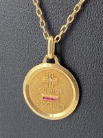 Médaille d'amour et sa chaîne en or jaune 750 mill....