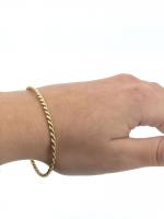 Bracelet torsadé en or jaune 750 millièmes (18k), poids :...