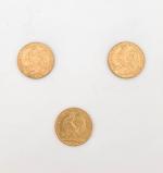 3 pièces de 20 Francs or décor au coq. Datées...