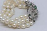Bracelet 3 rangs de perles de culture (diamètre 7 mm),...