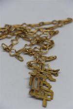 Collier en or 18k et pendentif géométrique en or (APC)...