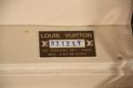 LOUIS VUITTON: "Vanity case" en toile monogrammée et cuir naturel....