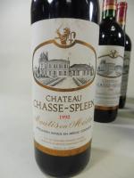 9 bouteilles Chateau Chasse-Spleen (bas goulot, petits manques aux étiquettes)
