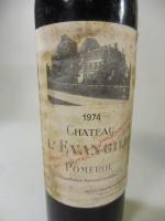 7 bouteilles Chateau L'évangile 1974 (petits manques et taches aux...