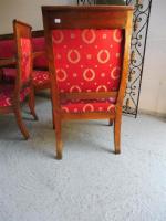 Un canapé et 4 fauteuils en bois fruitier sculpté de...