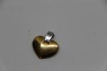 Pendentif coeur en or 18k et diamants. 3.2 gr (hauteur...