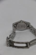 Baume et mercier. montre bracelet de dame acier (diamètre 25...