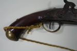 Pistolet modèle 1763-66 à silex transformé à percussion. 
Platine poinçonné...