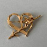 Lolita LEMPICKA : Broche coeur transpercé d'une flèche "Loilta"en métal...