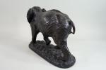 MASIER (XXème s.) : Eléphant marchant en bronze patiné marron...