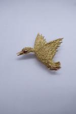 Broche pendentif en or jaune 18k représentant un canard, un...