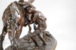 DU PASSAGE, Arthur (1838-1909)
« Lad sanglant une jument ». Bronze...