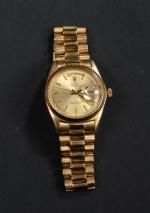 ROLEX OYSTER PERPETUAL DAY DATE. Montre d'homme en or jaune...