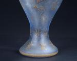 DAUM. Vase balustre en verre légèrement bleuté à décor dégagé...