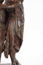 HUZEL, J. (XIXème). "Couple de dieux grecs", bronze à patine...