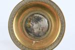ECOLE FRANCAISE XIXème. "Paysage animé". Miniature ronde peinte sous verre...