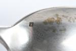 MENAGERE en métal argenté comprenant douze petites cuillères modèle uni-plat...