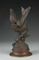 DELABRIERRE Edouard-Paul (1829-1912) : Oiseau perché. Bronze à patine brun-médaille,...