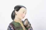 CHINE, (vers 1900). Paire de statuettes en porcelaine polychrome à...