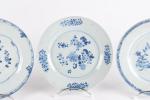 CHINE (fin XVIIIème). Quatre assiettes rondes en porcelaine à décor...
