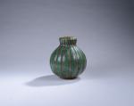 LOURIOUX, Louis (1874-1930). Vase boule en grès à godrons vert...