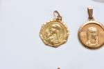 LOT d'OR jaune 750 millièmes : quatre médailles religieuse ;...
