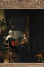 ECOLE ALLEMANDE du XVIIIème siècle. Scène de cuisine avec femme...