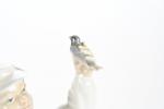 STATUETTES (trois) en porcelaine, l'une "Couple de colombes", "Royal Copenhagen"...