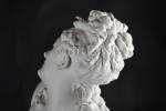 CARRIER-BELLEUSE, Albert Ernest (1824-1887). Buste de Flore. Biscuit sur piédouche....