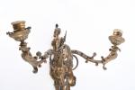 APPLIQUES (paire d') en bronze à trois lumières, décor feuillagé....