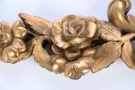 ELEMENTS (paire d') en bois sculpté et doré, décor floral....