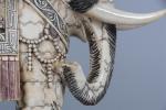 CHINE, 20ème siècle. STATUETTE d'ELEPHANT en os et placage d'os...