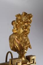 CARTEL d'applique en bronze doré orné d'un buste de satyre...