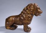 LION en bois sculpté et doré. Début du 19ème siècle....