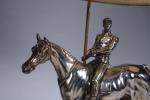 LAMPE "Jockey sur son cheval" en bronze argenté, montée sur...