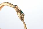 COLLIER "serpent" articulé en or jaune 750 millièmes, la tête...
