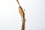COLLIER "serpent" articulé en or jaune 750 millièmes, la tête...