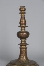 PIED de croix en bronze, décor gravé d'instruments de la...