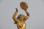 STATUETTE en bronze ciselé et doré représentant une danseuse assise...