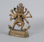 TIBET
Statuette en bronze à sujet de Samvara. H. 23 cm...